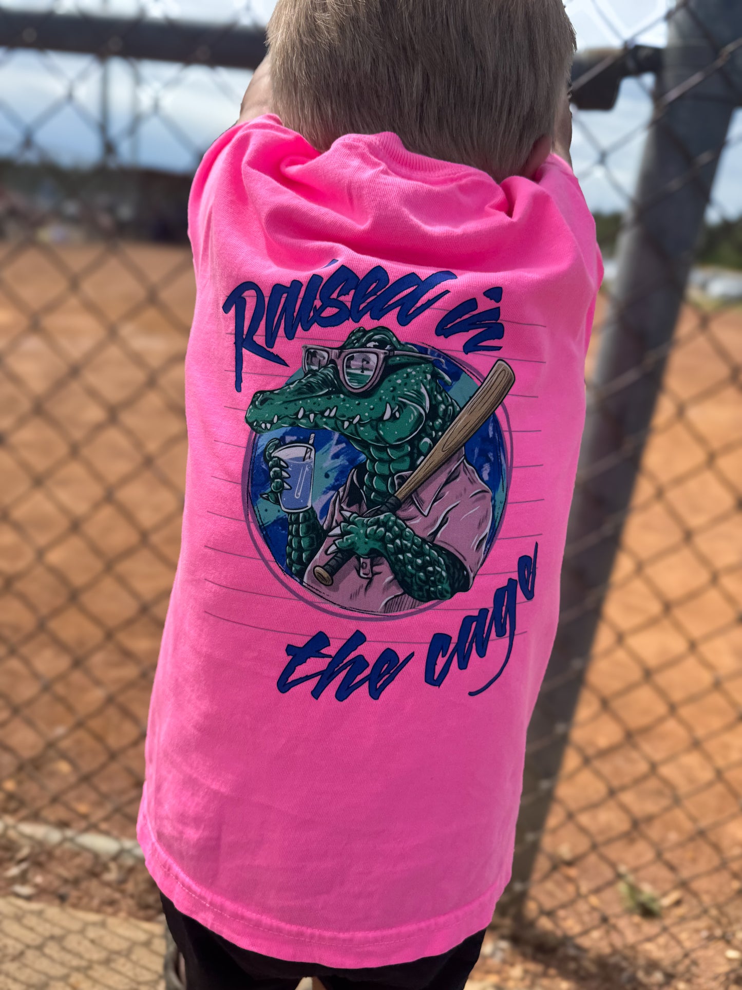 Raised in the cage | Graphic T-Shirt